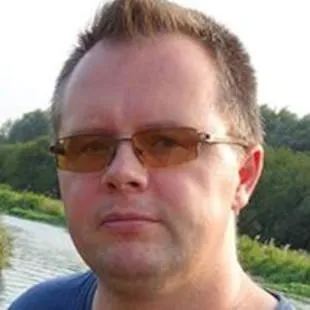 Headshot of Gust Alston