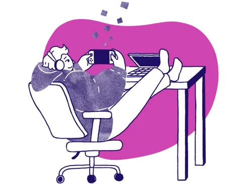 Person with their feet up on the desk