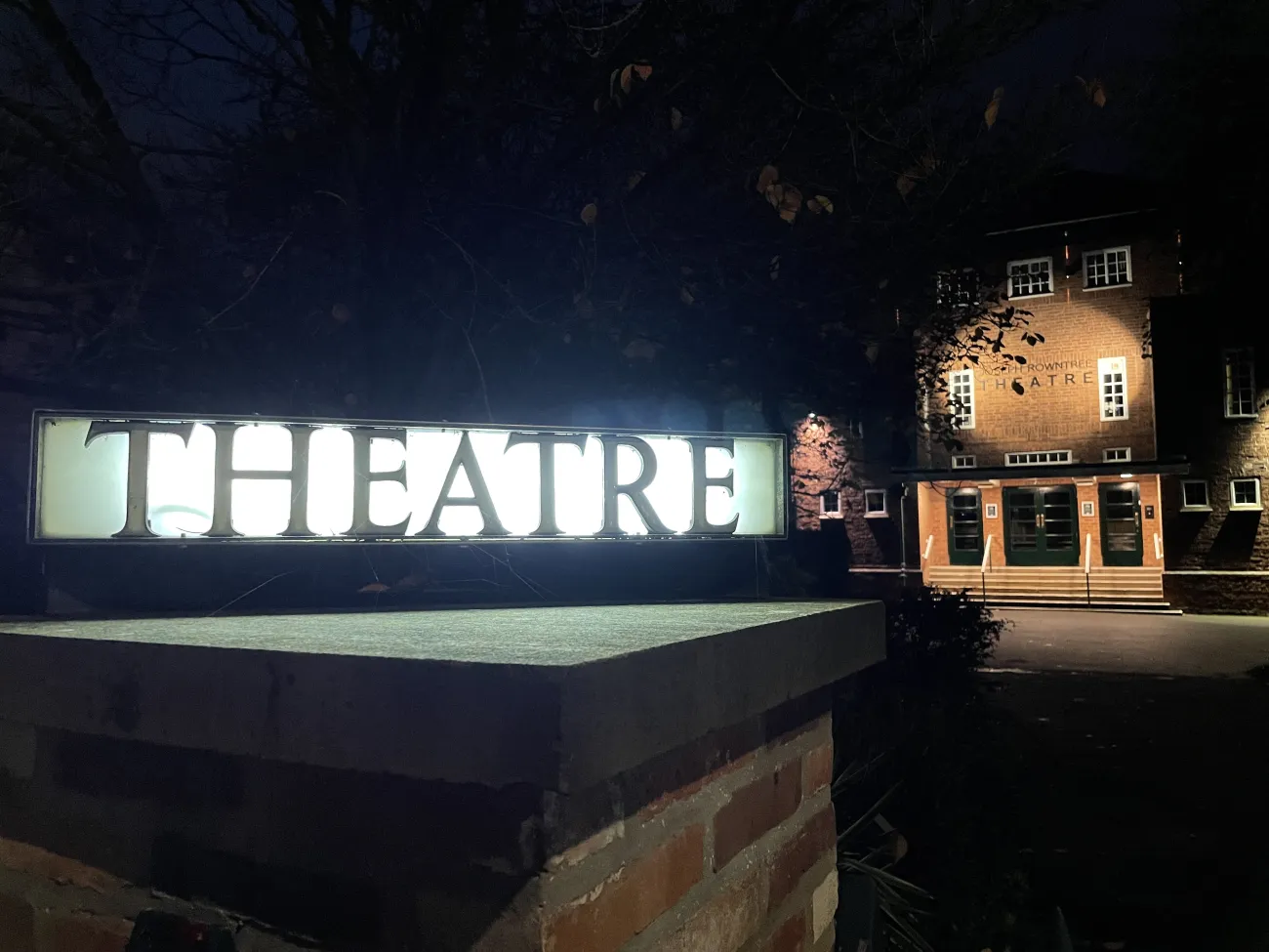 The outside of the Joseph Rowntree Theatre at night