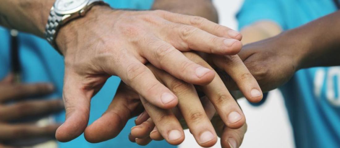 Image of hands holding each other