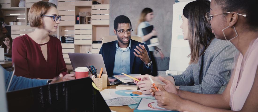 People working together round a table 